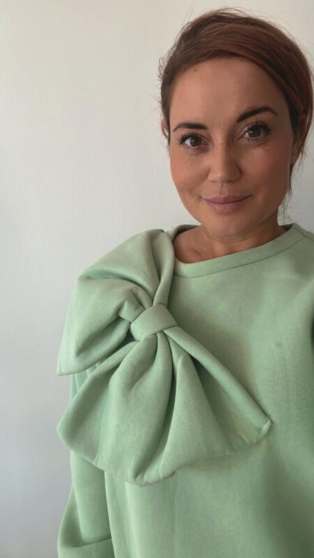 Mintgroene trui met grote strik