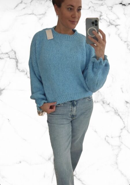 Blauwe trui met ruffle mouw