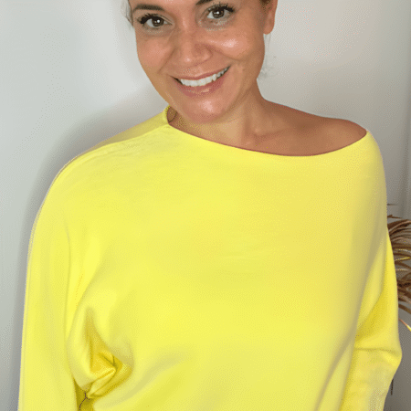 Gele trui met ruffle
