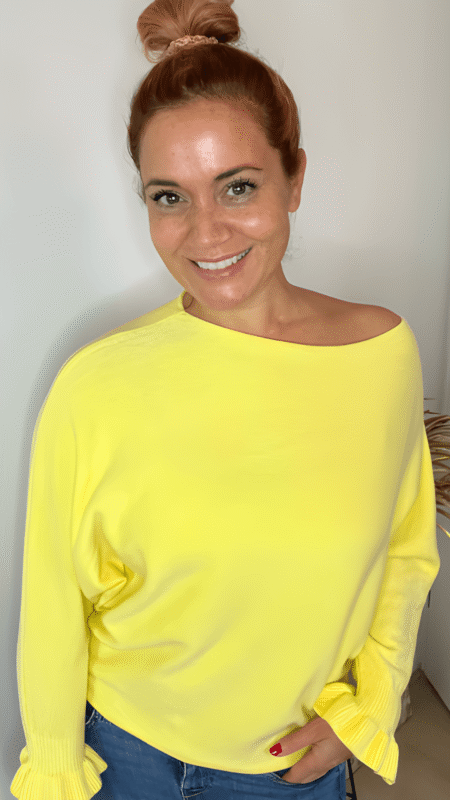 Gele trui met ruffle